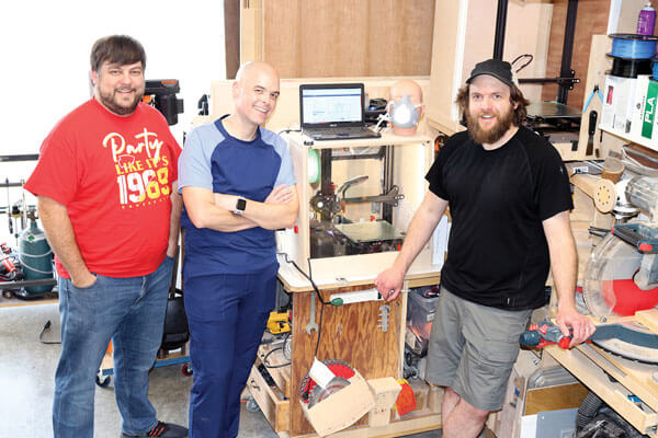 Matthew Winder, Matt Havens and Keith Kelly helped create respirator masks.