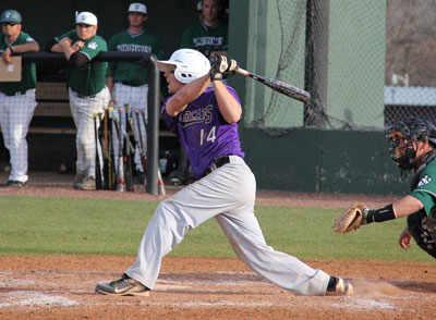 Landon Young playing baseball