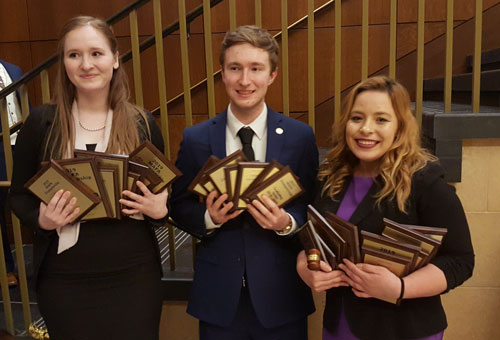 SBU seniors Mikayla Throne, Andrew DeShon and Marisa Mayo celebrate their debate state championship.