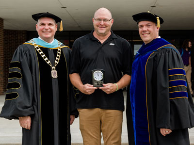 Brad Beckham (center) director of Meyer Wellness and Sports Center, was named Staff Newcomer of the Year.