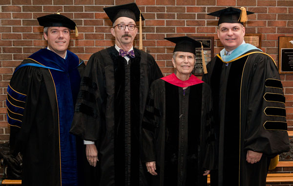 Lee Kanakis (second from left) and Rev. Barbara Clemmons (third from left) received honorary doctorates from SBU Provost Dr. Lee Skinkle (far left) and SBU President Dr. Eric A. Turner (far right) at Founders' Day on March 4.