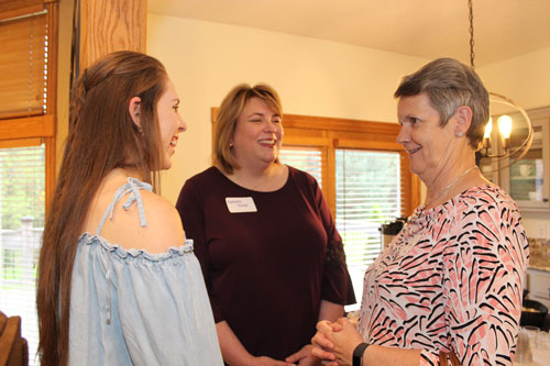 Emma Turner and SBU First Lady Barbara Turner visit with Donna Neil at the First Lady Welcome Tea.