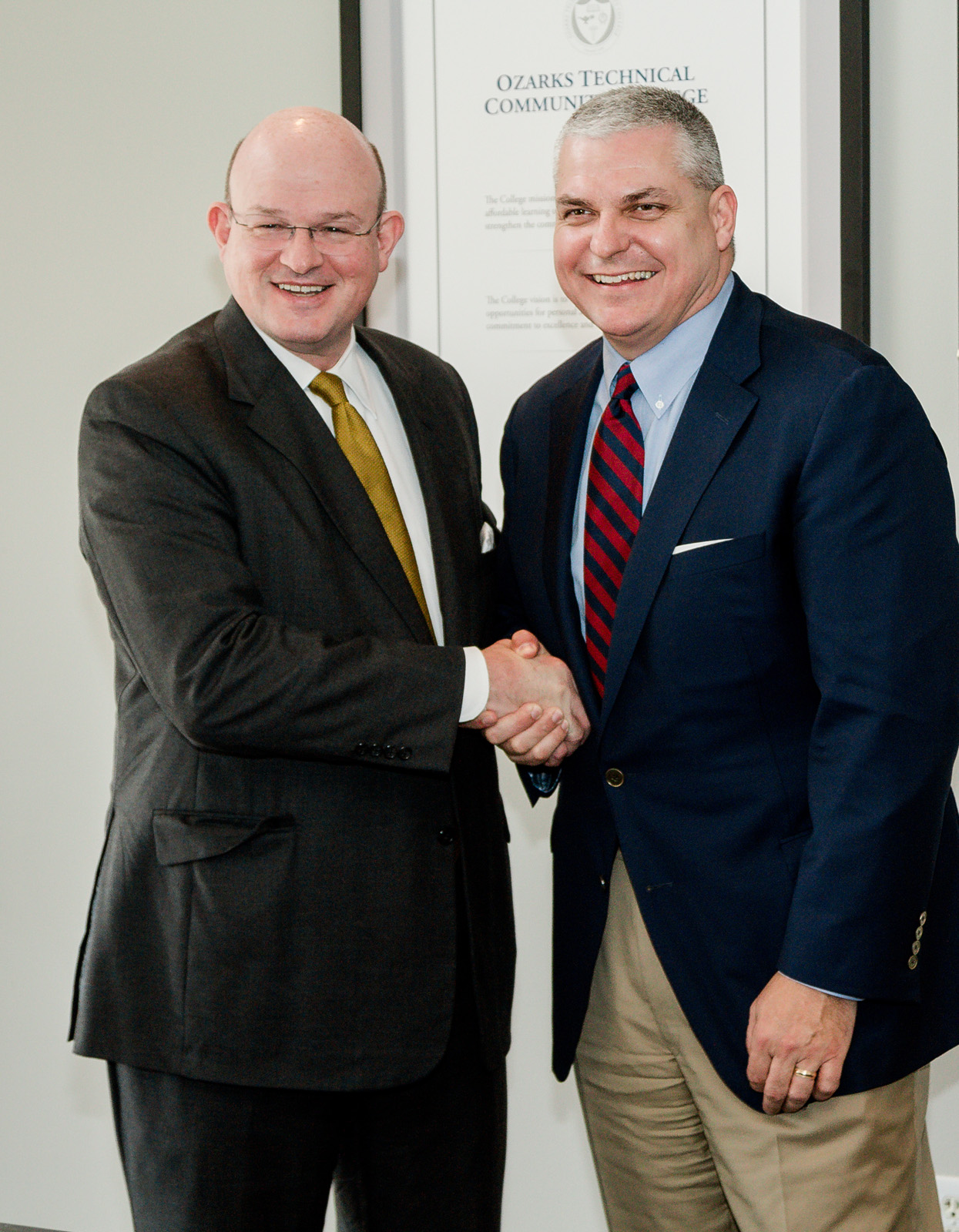 Dr. Higdon and Dr. Turner shake hands