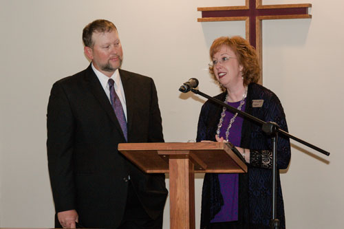 Robbie and Dr. Julie Bryant address the audience at the dedication ceremony for Randolph Chapel.