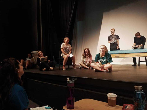 Bethany Vermillion, director of "Wit," engages with the actors during rehearsal.