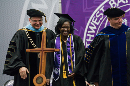 Sylvia Ofori-Yeboah receives Life Beautiful award from Dr. Eric Turner and Dr. Lee Skinkle