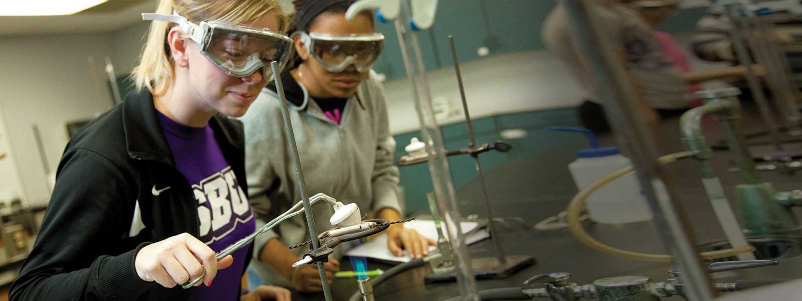 students work on chemistry experiment