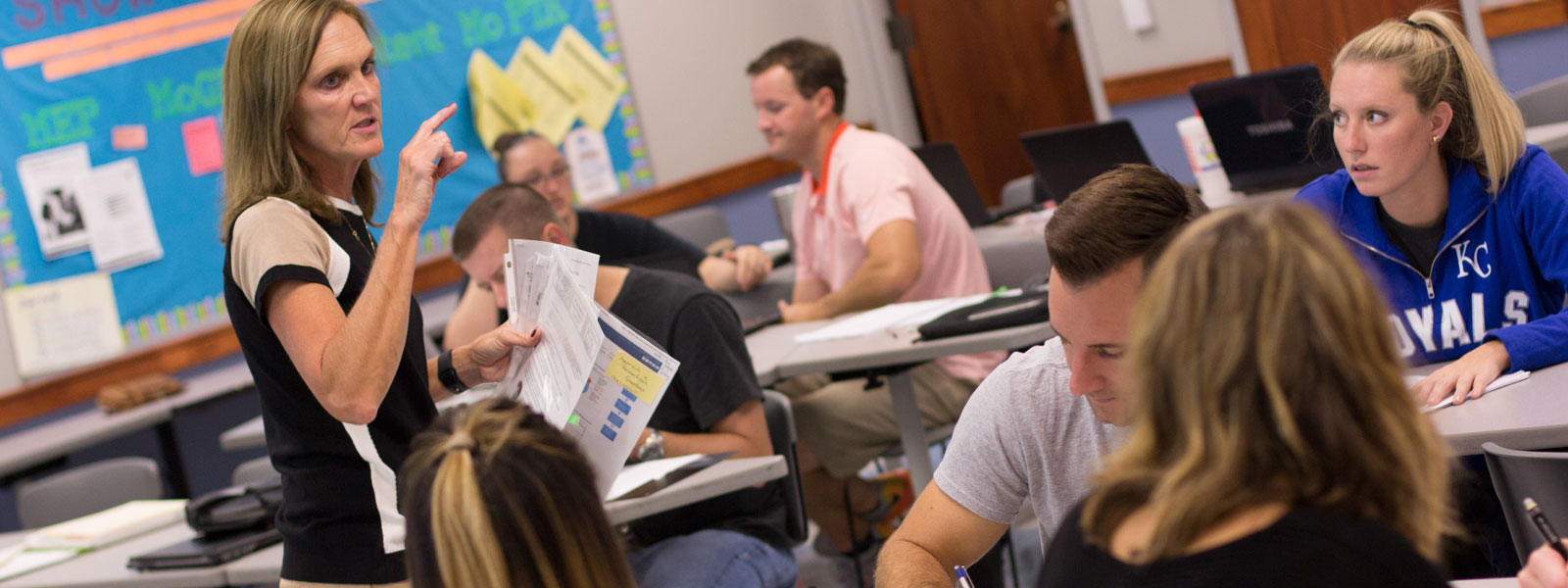 professor giving instructions to class