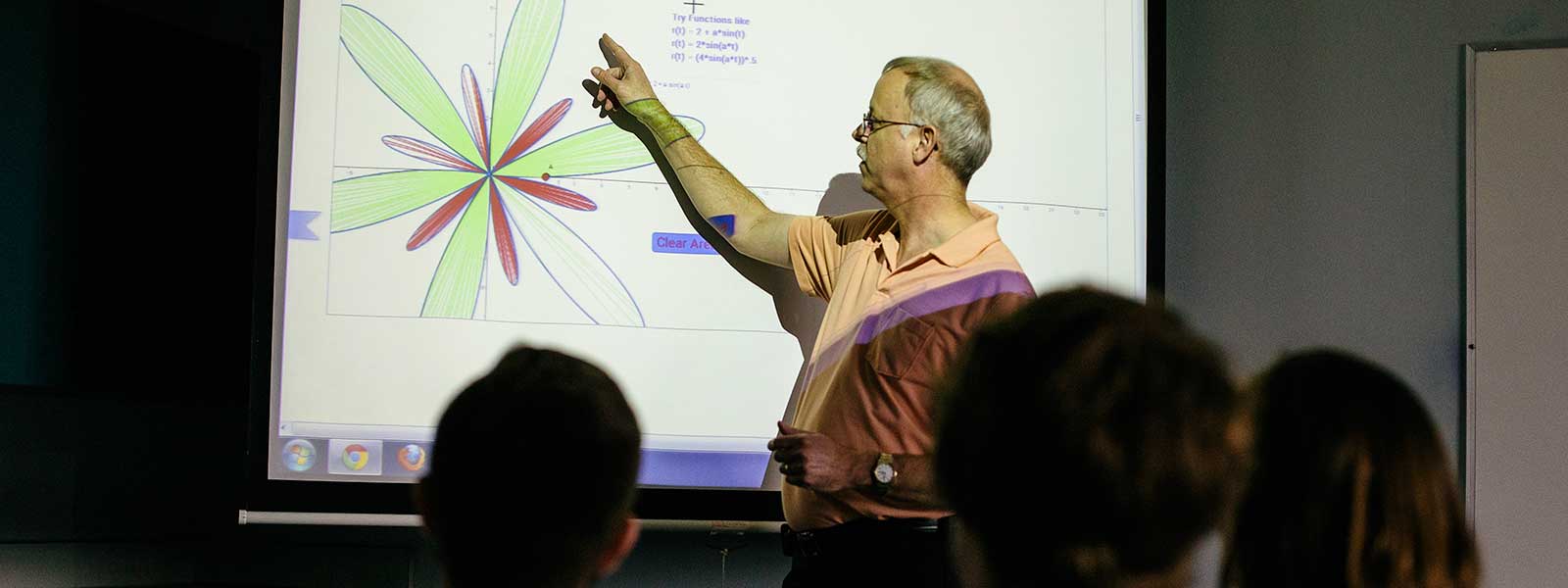 math professor explains diagram on projector