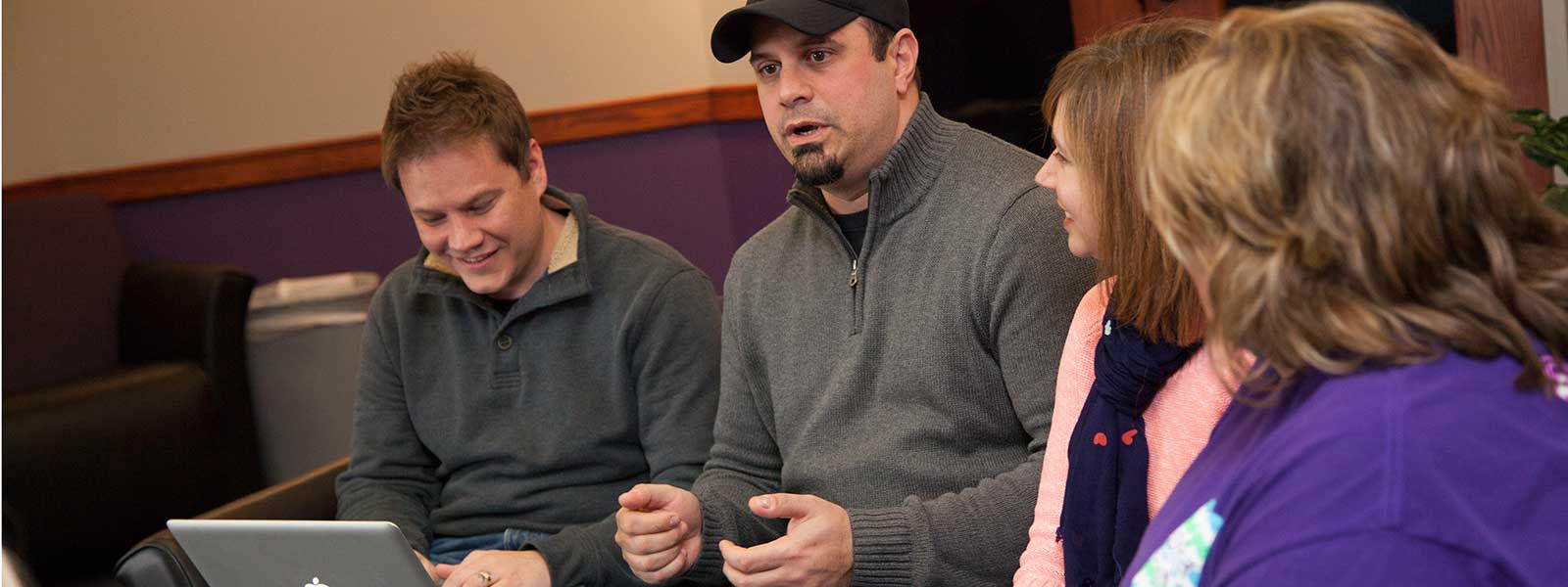 graduate students work on group project