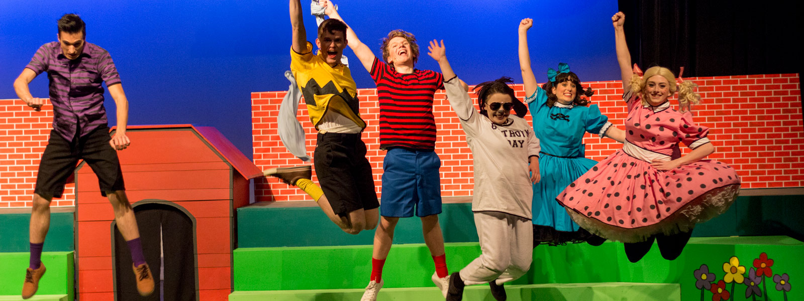 students performing in theatre production of "You're a Good Man, Charlie Brown"