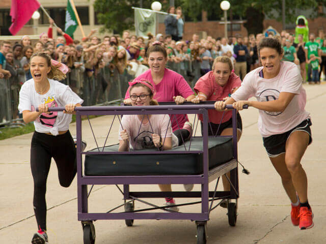 SBU students participating in bed races